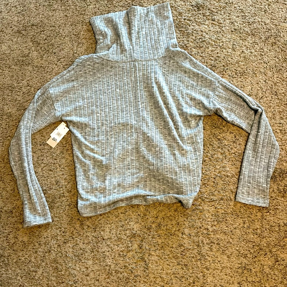 Grey Turtleneck.